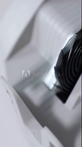 Rotating mechanism turning quickly money in the currency counter machine. One hundred dollars in the slot of apparatus. Close up. Top view. Vertical video