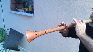 Zurla - Zurna is traditional Macedonian folk woodwind instrument. Zurla has seven holes and one thumb hole on the back side, and exhaust holes in the bottom, and a reed in the upper drive. Zurla play two octaves of (approximately) the natural scale. Chromatic tones (D #, F #, A # and B #) can also be played by changing the combination of pressure and coverage holes tones. When playing Zurla is held with both hands at an angle of approximately 45 ° to the sight. The fingers of the left hand cover