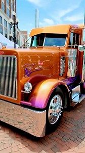 Slammed and stunning: this old school peterbilt custom is turning heads with its vibrant orange-to-purple fade paint job and classic chrome accents. a true showstopper. #peterbilt #peterbilt379 #peterbilt389 #customsemi #showtruck #bigrig #trucksofinstagram #slammedtrucks #chromegang #trucklife | Henry Tambun