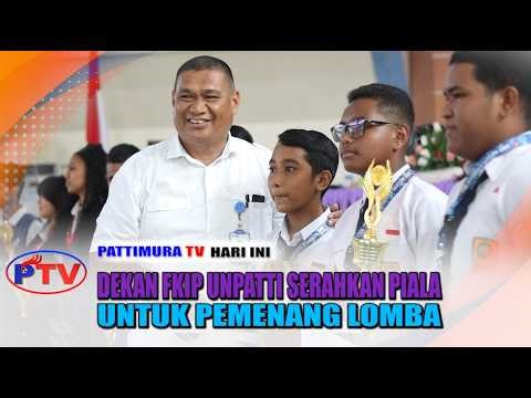 THE DEAN OF FKIP UNPATTI HANDED AWARDS TO THE WINNERS OF THE COMPETITION