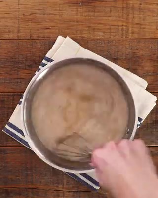 We turned our classic cornbread recipe into an irresistible bread pudding, topped with homemade whiskey caramel sauce. Get the recipe: https://trib.al/anwYtWE | Southern Living