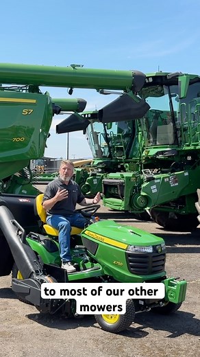 The John Deere X750 Signature Series Lawn Tractor can tackle any yard work year-round. #johndeere