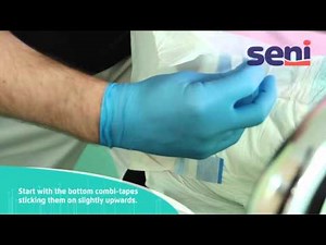 [EN] 06 Seni - All in one diapers application on a standing person