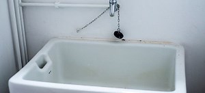 How to Prevent Ongoing Clogs in a Utility Sink | DoItYourself.com