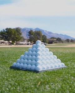 3.1M views · 10K reactions | Oddly satisfying. Golf ball pyramids: the eighth wonder of the world 朗 | PGA TOUR Champions | Facebook