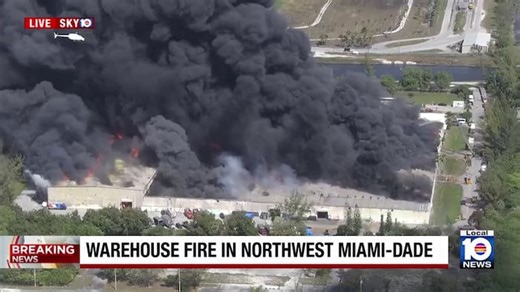 Large warehouse fire burns in northwest Miami-Dade