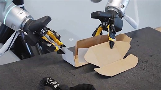 Impressive robot calmly folds parcel box for shipping