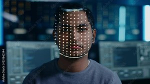 Handsome Young Indian Man is Identified by Biometric Facial Recognition Scanning Process. Futuristic Concept: Projector Identifies Individual by Illuminating Face by Dots and Scanning with Laser