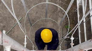 Technical engineer Inspecting the installation of the solar panels and checking the integrity of all wires connected to the solar panels. for the system to work properly