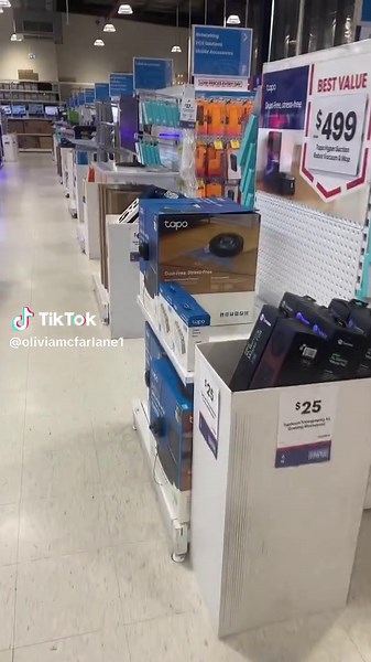 Hazzy Fiddling with New iPhones at Office Works