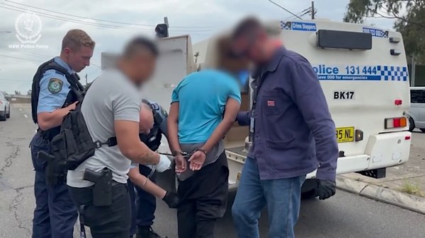 Detectives swoop on alleged hit squad in Revesby