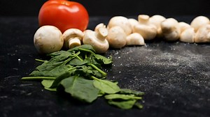 Dropping a pizza onto a table - Free Stock Video