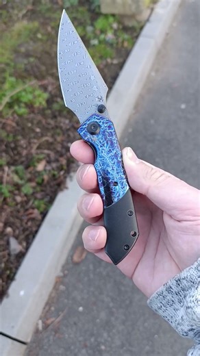 Kansept Fenrir damascus steel blade and lightning strike titanium finish. @KanseptKnives