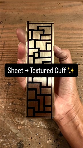 Gaby Moss Designs on Instagram: "Another fun cuff experiment ✨ There’s a lot you can do with simple tools and heat from the stove. Nothing fancy required. I love playing around with metal stamps to create different textures. #jewelrydesign #handmadejewelry #handmadecuff #artprocess"