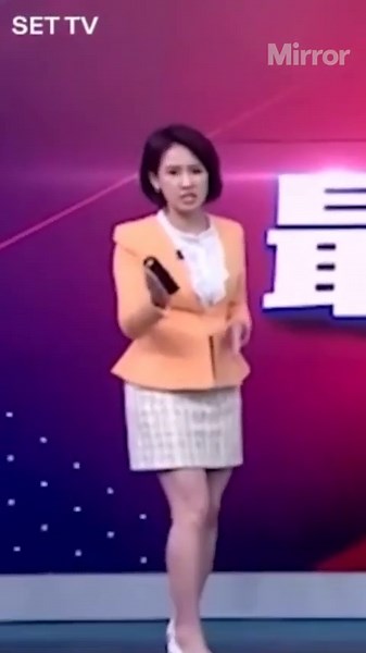 Taiwan earthquake reporter shakes during live broadcast