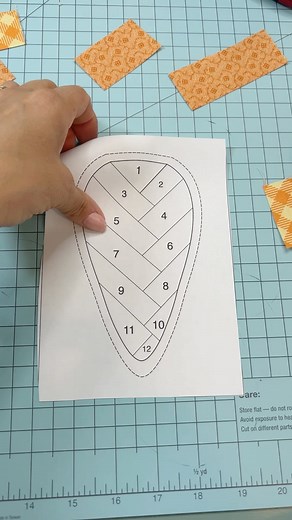 Carrot paper piecing - part 1! This carrot pattern will be available Friday! In part 2 I’ll show you how to assemble it & you can make an entire basket of carrots. Have you tried paper piecing yet? If not what’s holding you back? I would love to help you! #paperpiecing #fpp #sewingroomorganization #sewingtutorial #quiltingtechniques #easterdecor #easterbasket #quiltingfabric #sewingstudio | The Little Green Bean