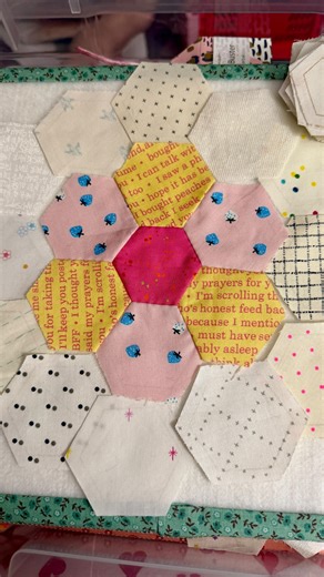 Nic 🪡 Patchwork + Quilt Designer 🧵 Hand piecing + applique on Instagram: "Sunday sewing and sorting. This is a long term project for me. Using 1 inch patchwork hexagon stamps, I am hand sewing a fresh Grandmother’s Flower Garden quilt. This is how I store ongoing projects: 12 inch (30cm) scrapbook boxes. For this granny project, I have stamped and cut a batch of hexagons, then laid them out on design boards ready to sew. So when I have a spare pocket of time, I can grab the box and get straigh