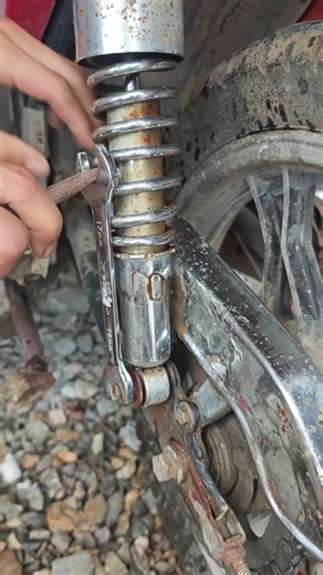 Progressive spring shock adjustment method