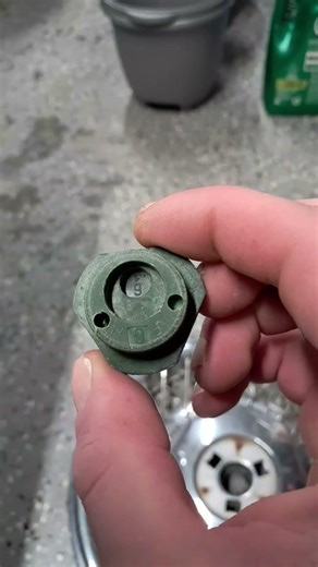 Buick or Oldsmobile wire hubcap center removal trick without the key.