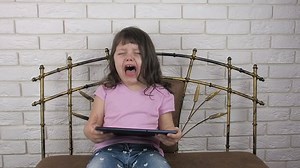 Little Girl Crying Tablet Stock Footage Video (100% Royalty-free) 34859770 | Shutterstock