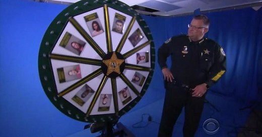 Florida cop looks for suspects with "Wheel of Fugitive"