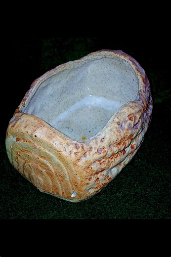 Moira Pottery Works was founded in 1922 near Burton-on-Trent, and operated until December 1991. The Hillstonia Range was produced from 1934 to 1972, designed primarily for horticultural use—bulb forcing, plant containers, and rustic garden ware. This small planter/bulb forcer weighing 254g and measuring 11 x 9 x 6cm, is a good example of its mid century output. Moira pottery is moderately collectable (there is a facebook group https://www.facebook.com/groups/521665428173606) and this would make 