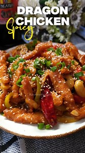 Dragon Chicken Ingredients : 300g Chiken Breast (cut into strips 1tsp Salt 1tsp Degi Mirch 1tbsp Ginger Garlic Paste 1/2tsp White Pepper Powder 1 Egg 2tbsp Cornflour Oil to Deep Fry 2tbsp Oil 2tbsp Garlic (chopped) 2 Dried Red Chillies 7 - 8 Cashewnuts 2 Chillies 1 Small Onion 1/4 pc Green Capsicum 1/4 pc Red Yellow Bell Pepper 1/4 pc Yellow Bell Pepper 1/2 Cup Water 1/2tsp Salt 1tsp Aromat Powder 2tbsp Schezwan Sauce 1tsp Vinegar 1tsp Light Soya Sauce 2tbsp Tomato Sauce or Ketchup 2tbsp Spring 