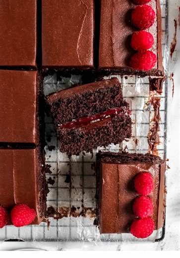 Chocolate & raspberry are one of those combos that just go together & this Chocolate Raspberry Sheet Cake is soooo good 🤤 soft tender chocolate cake filled with raspberry preserves & topped with a fudgy frosting, this cake is easy but so delicious 😍 for the full recipe click the link in my bio & search raspberry or google Chocolate Raspberry Sheet Cake My Messy Kitchen #recipe #cake #foodblogger #foodtiktok #fyp