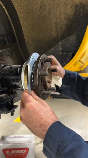 Part 1 of the 8¾” Rear Disc Conversion with Rallye Restorations 🔧 This video walks through installing the axle, positioning the caliper bracket, and selecting the right shims for the LEED Brakes 8¾" rear disc conversion kit. Head to Rallye Restorations' social for Part 2—where they cover axle end play adjustment! | LEED Brakes