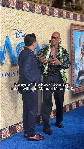 Lin-Manuel Miranda and The Rock pose on the "Moana" carpet
