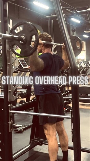 STANDING OVERHEAD PRESS A perfect example of a full-body exercise. The legs, core, shoulders, arms, and back must all work together to press the weight overhead properly. Everything has to come together to execute this movement well. Visit williamcharters.com and download The Fundamentals of Building Muscle & Burning Fat to master this process. #bodybuilding #strengthtraining #buildmuscle #gym