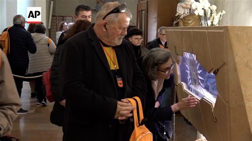 Catholic church to canonize first millennial saint as pilgrims flock to teen's shrine