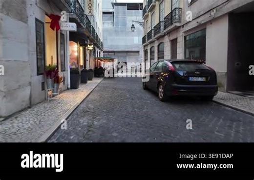 Lisbon city evening POV walk through downtown streets Stock Video Footage - Alamy