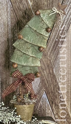 🌲🤎 Rustic Wonky Tree — full of primitive charm, a little jingle, and that perfectly imperfect rustic look I love so much. 🤎✨ 🎥 Enjoy the short video on how I put it together! ✨🤎🌲 #lonetreerustics #primitivechristmas #rusticdecor #handmaderustic #diychristmas #rusticcrafts #holidaycrafts #diy #crafts | Lone Tree Rustics