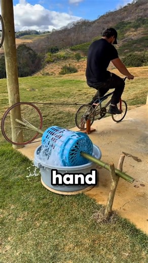 This man built a washing machine using a bicycle 😱🚲No electricity. Just pure creativity.#shorts
