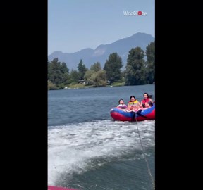 Girl falls into water during her very first tubing adventure with her friends