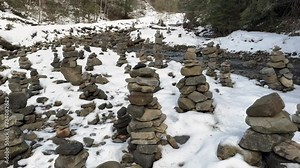 stone structures land art pyramids in the valley of the Zhenets river, Ukraine, Carpathians were left by tourists who really love these places on the way to the Guk waterfall