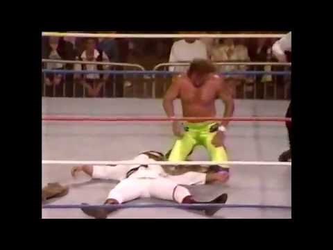 SNME #6: Jake "The Snake" Roberts DDTs Ricky "The Dragon" Steamboat on the concrete.