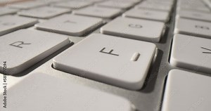 Closeup of white computer keyboard. Best computer keyboards and usability