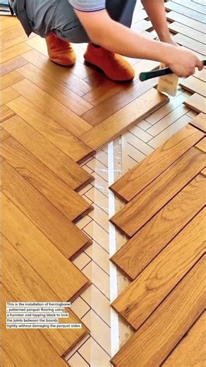 Precision Herringbone Wood Floor Installation Using Tapping Block & Hammer Technique