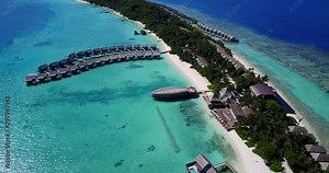 Luxurious over-the-water bungalow, where can watch sea bed, paddle to your own private motu or plonk down under a palm tree, The Maldives