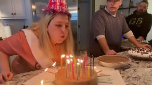 Birthday fail: Woman's hair catches fire when she blows candles on her birthday