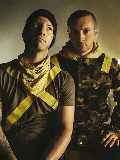 Twenty One Pilots - Jumpsuit, is a 2018 song, released as the lead single from their Trench album after a year-long silence. It explores themes of anxiety, insecurity, and the pressure of fame. The yellow jumpsuit represents protection and a shield against the bishops of Dema in the album's lore. #twentyonepilots #lyrics #lyricsvideo