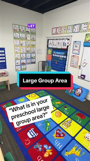 Let’s walk through my preschool classroom large group area. This is where we come together for lessons, discussions, and read-alouds, so I keep the most important classroom supports right here where we can use them regularly. In this space you’ll see: \t•\tProblem-solving skills posters \t•\tOur visual schedule \t•\tHandwriting Without Tears letters and numbers \t•\tA whiteboard for lessons \t•\tHandwriting Without Tears magnetic lines and curves \t•\tEnvironmental print \t•\tOur letter of the w