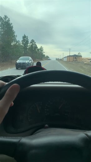 Stock 02 2500 hd Chevy towing empty dump trailer