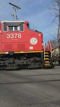 CN 3877 Westbound container in well car train, "K" LINE RAIL BRIDGE well car, CN 3378 DPU