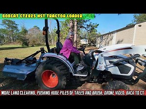Bobcat Tractor CT2025, pushing huge piles of trees, drone video, back to CT