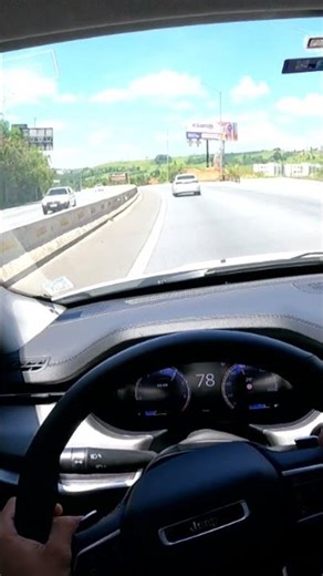 Compass pushing the Corolla on the highway.