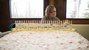 Weavers turn plastic bags into compassion