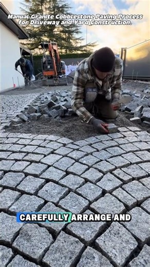 Manual Granite Cobblestone Paving Process for Driveway and Yard Construction.